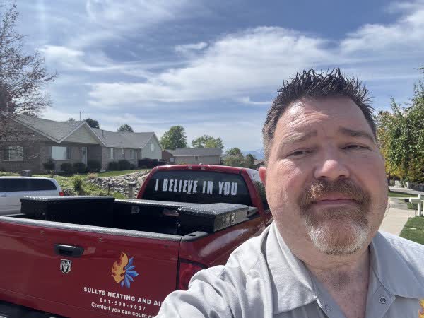 Sullys Heating and Air service truck serving Utah County